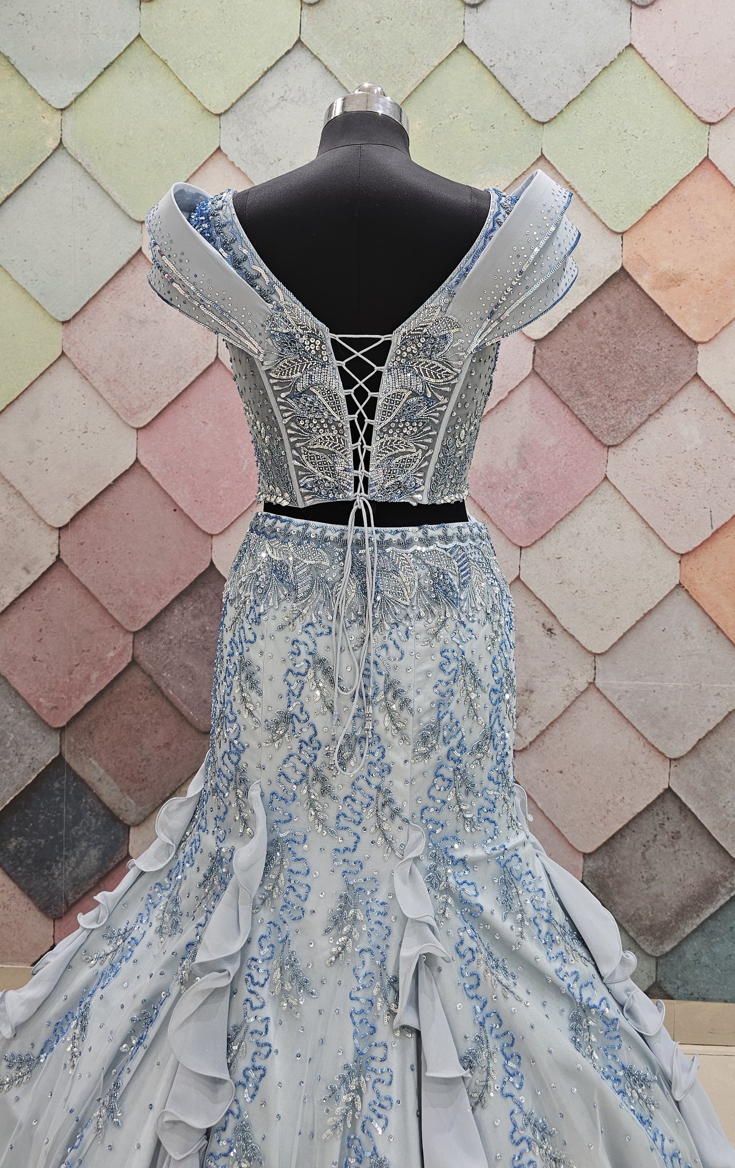 GAURAV GUPTA stunning designer outfit in a beautiful ice-blue shade, crafted with complete hand work on both front and back fish-cut  crop top lehenga