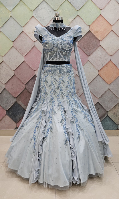 GAURAV GUPTA stunning designer outfit in a beautiful ice-blue shade, crafted with complete hand work on both front and back fish-cut  crop top lehenga