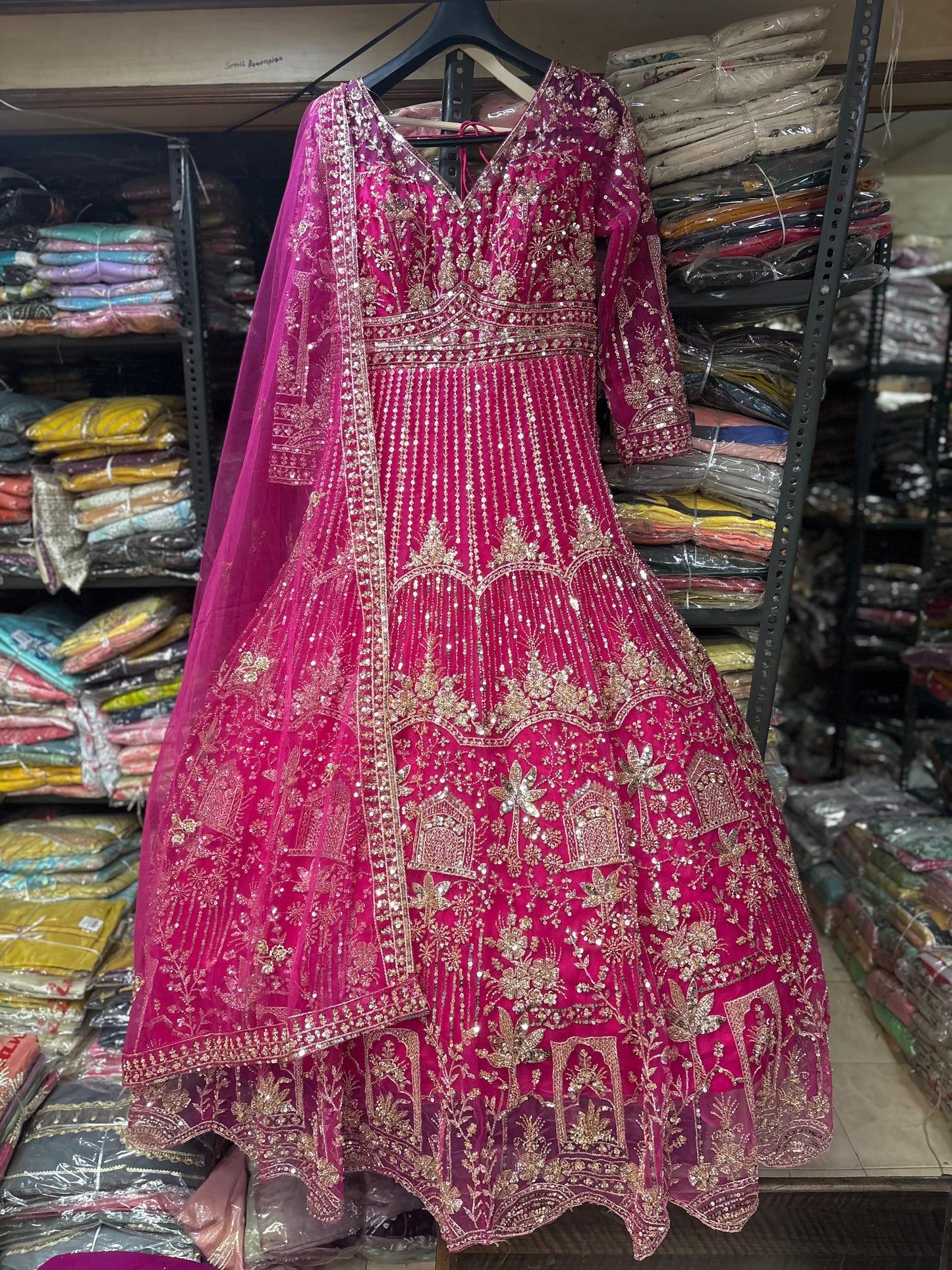 Attractive Hot pink mandir handwork gown