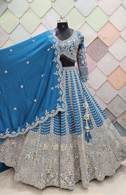 Premium silk with beautiful silver kundan and stone work with full flair heavy ghera, intricately work on  front and back Full sleeves blouse blue Ready to Wear crop top Lehenga