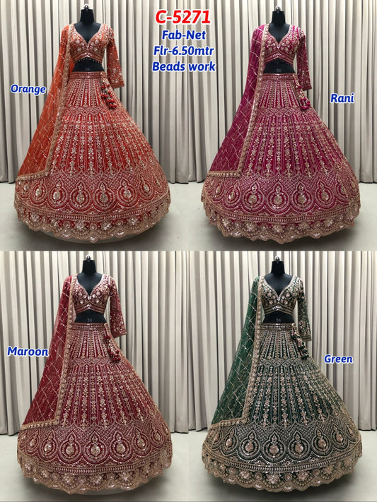Rust Orange Rani Pink Maroon Green Net Lehenga