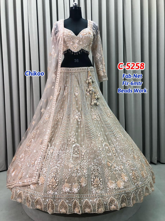 Chiku Golden Net Lehenga
