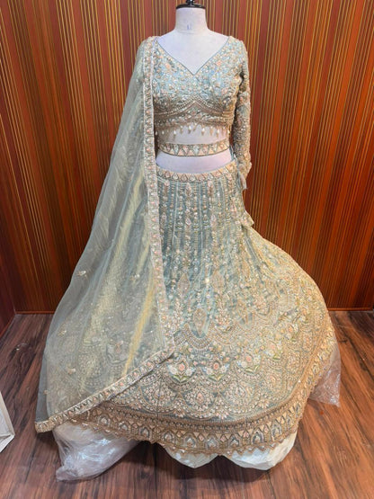 Pink golden green net crop top Lehenga