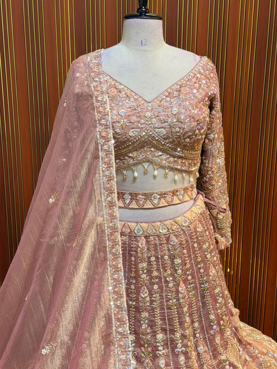 Pink golden green net crop top Lehenga