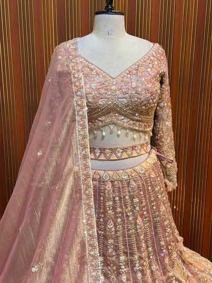 Pink golden green net crop top Lehenga