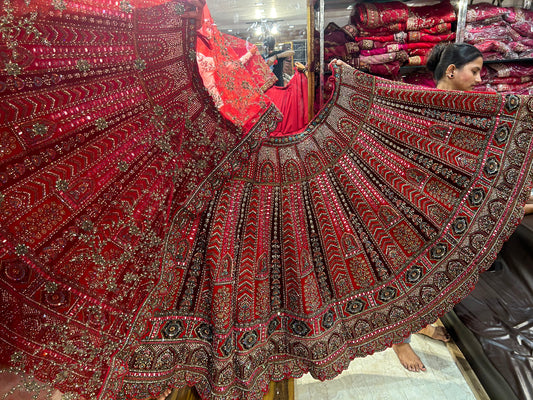 Tremendous red bridal cutwork Lehenga - Shopping World