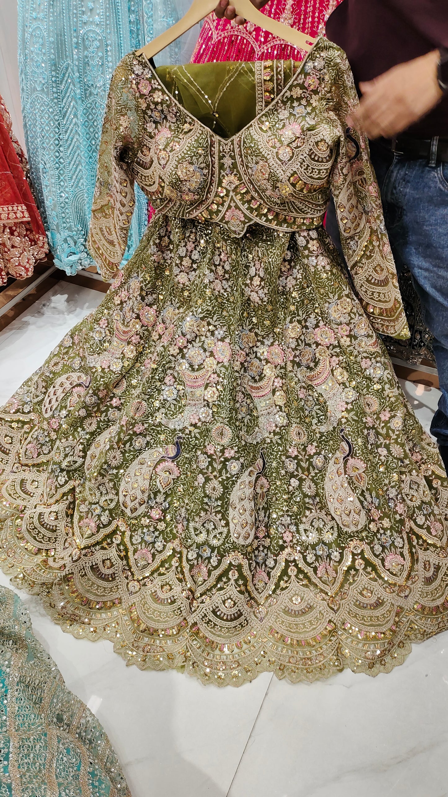 Fabulous Mehendi green peacock crop top Lehenga