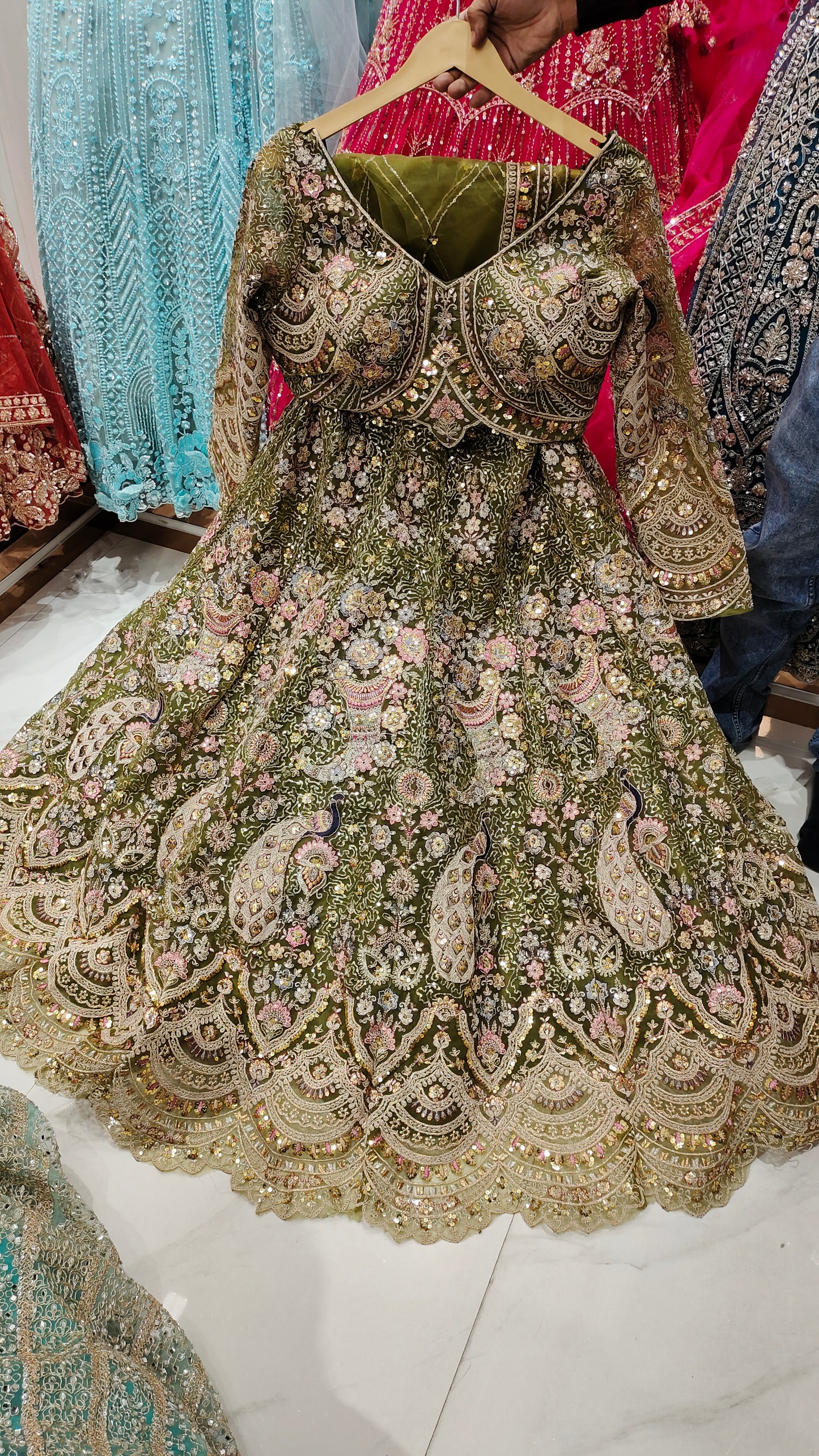 Fabulous Mehendi green peacock crop top Lehenga
