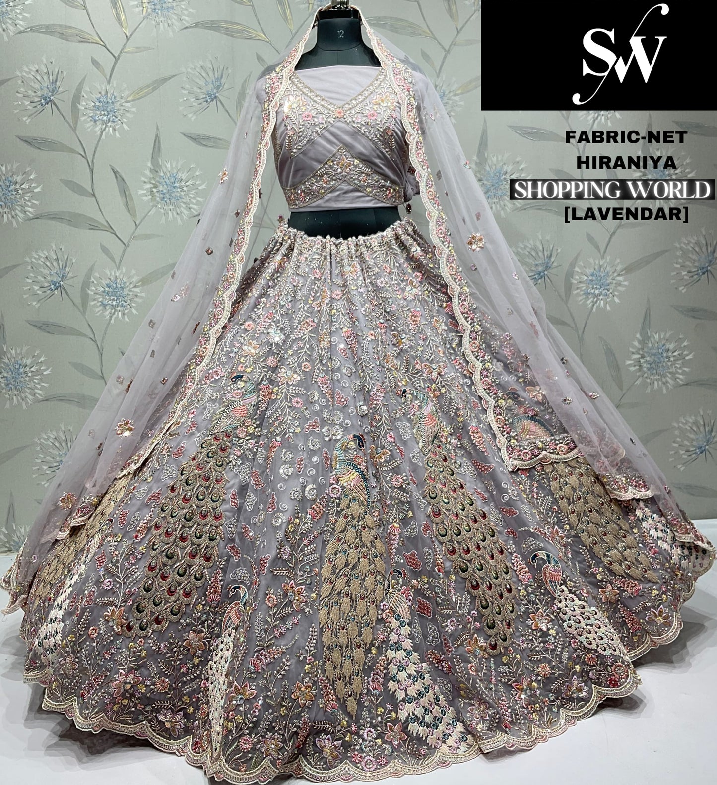Eye catching peacock Net Cream Lehenga