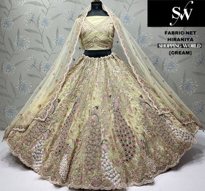 Eye catching peacock Net Cream Lehenga