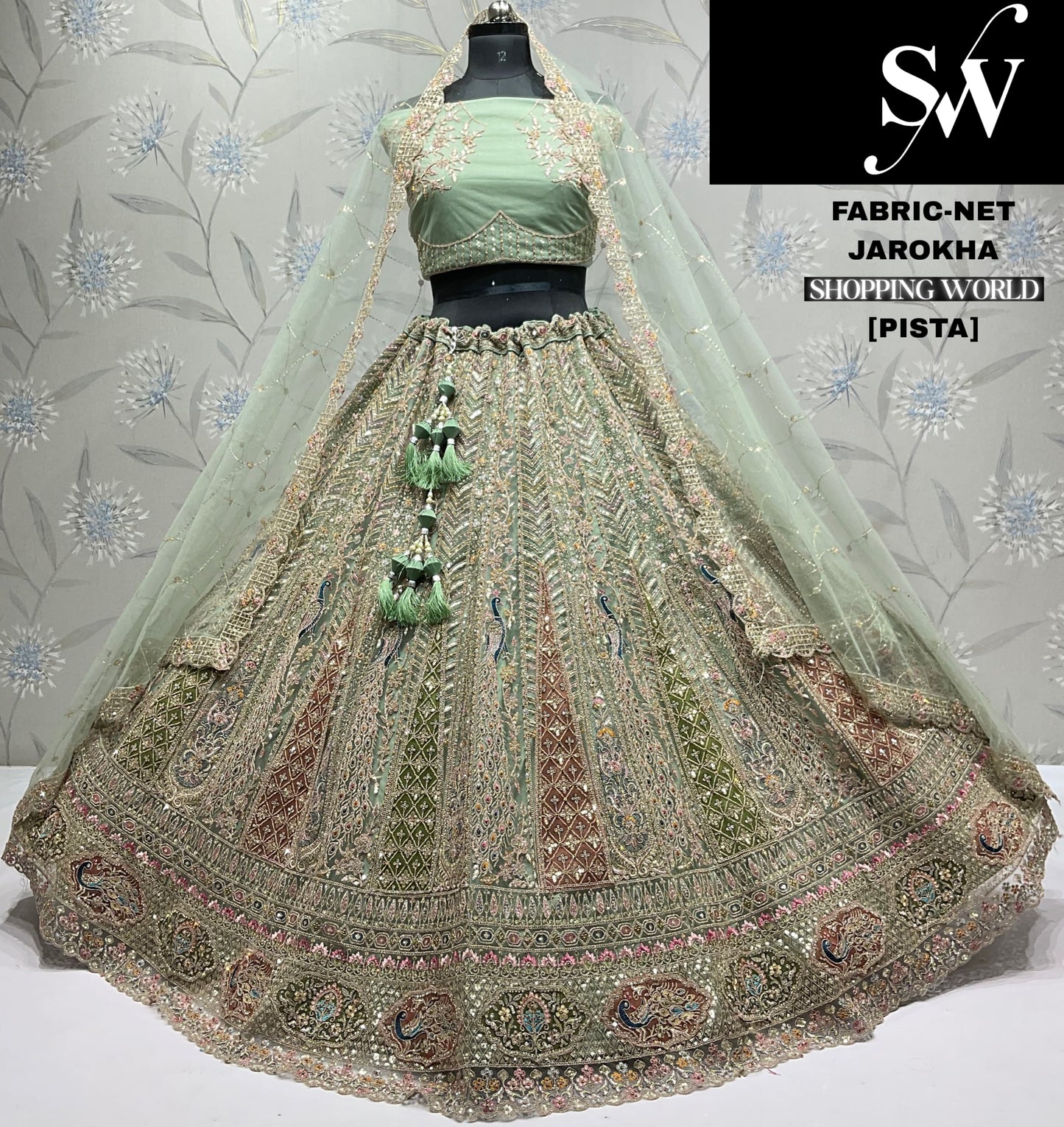 Designer pista green peacock net Lehenga