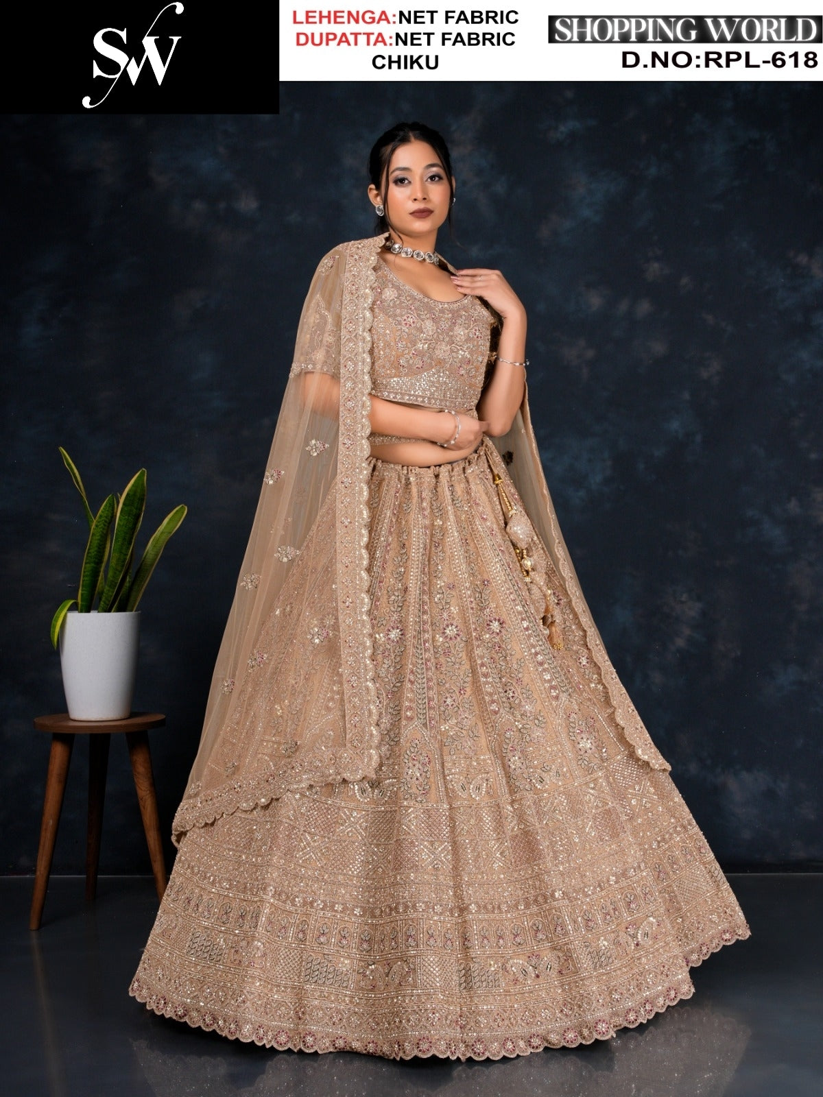 Tremendous golden Chiku Net Lehenga