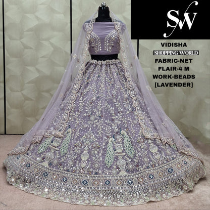 Good looking Lavender  Peacock Beads Net Lehenga
