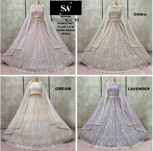 Something different Cream pink Chiku golden Lavender net lehenga