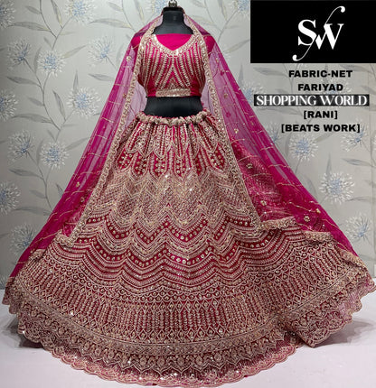 Elegant Rani pink Beats Work Net crop top Lehenga