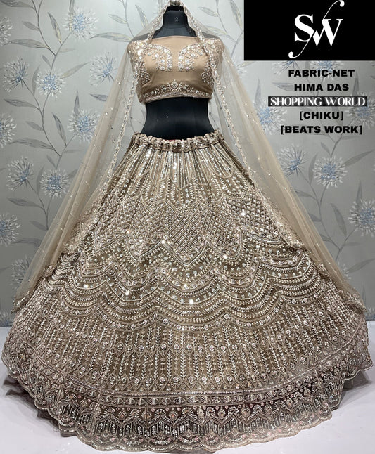 Amazing Chiku golden golden Beats work Net Lehenga