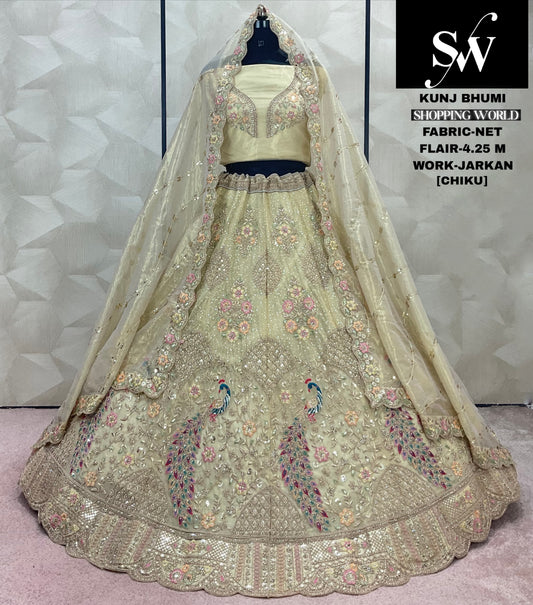 Engaging Chiku Golden peacock Net Lehenga