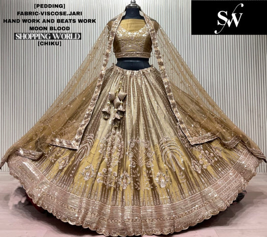 Tremendous Chiku golden Viscose Jari lehenga