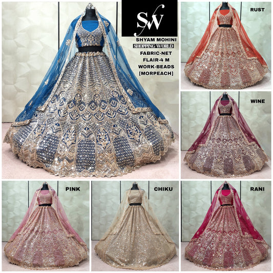 Rust Orange Wine Rani pink Chiku golden Baby pink Net Lehenga - Shopping World