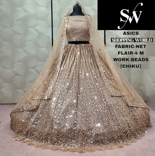 Chiku golden Net Lehenga