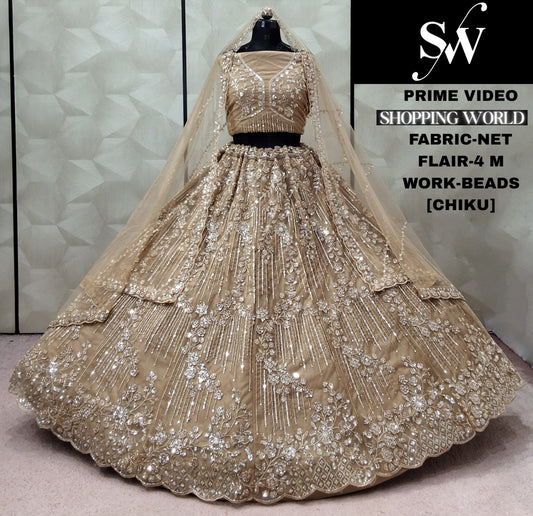 Chiku golden Net Lehenga