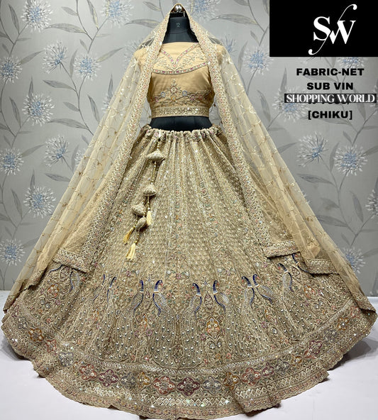 Chiku golden Peacock Net Lehenga