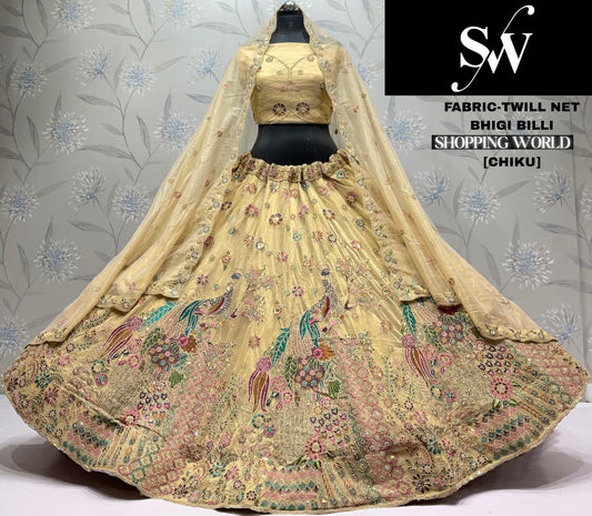 Chiku Golden Peacock Twill Net  Lehenga