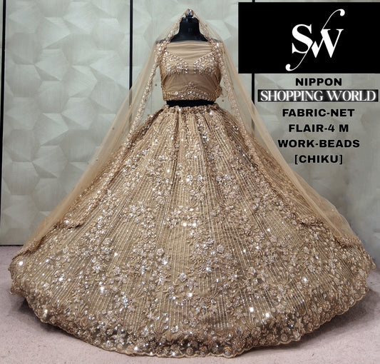 Chiku golden Net Lehenga