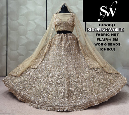 Chiku golden Net Lehenga