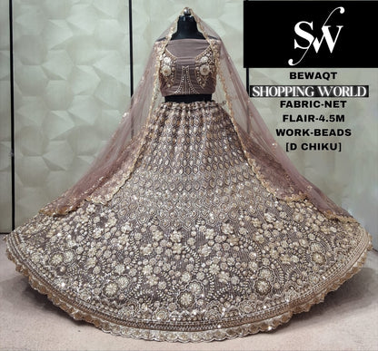 Chiku golden Net Lehenga
