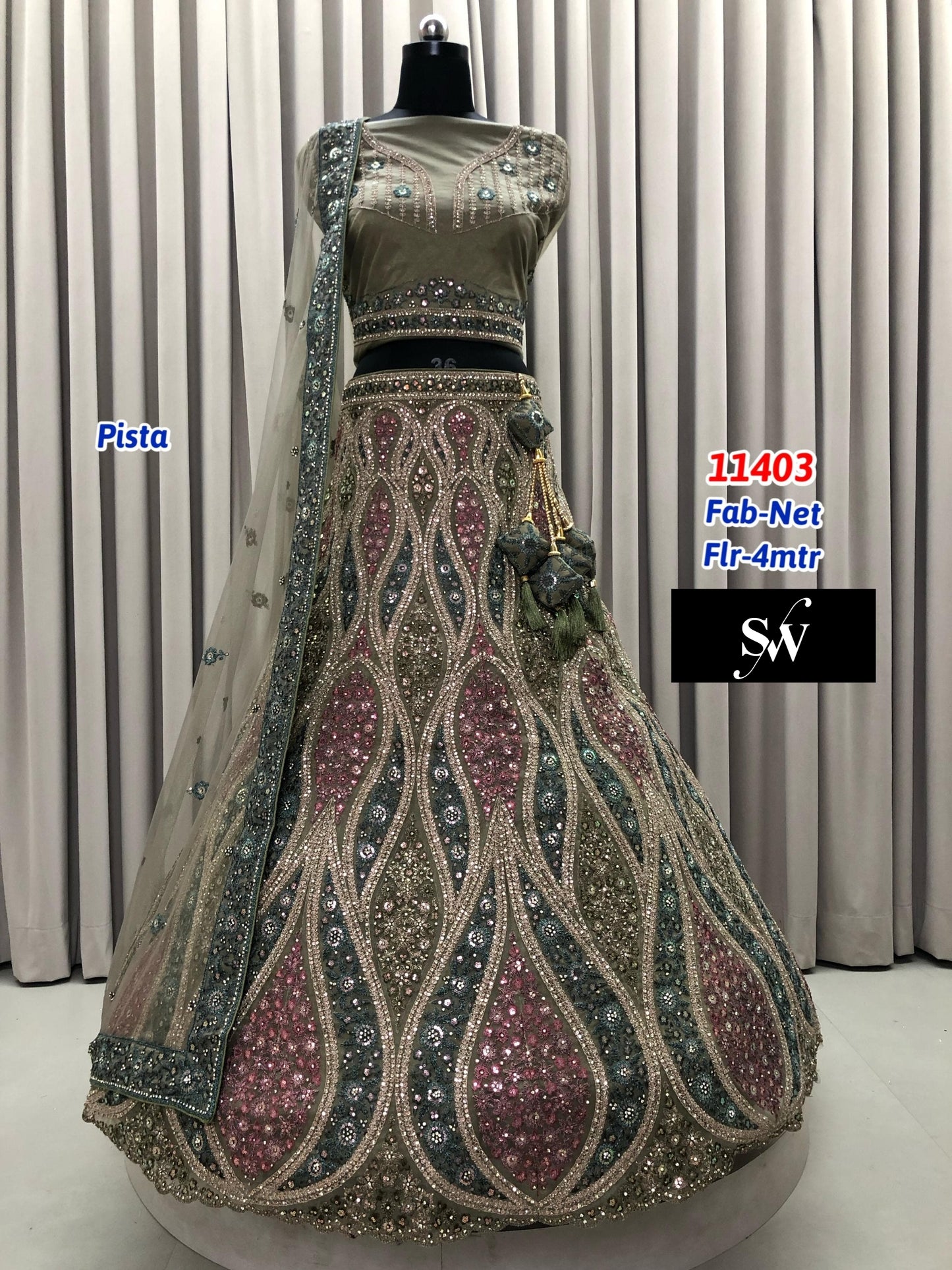 Pista Green Net Lehenga