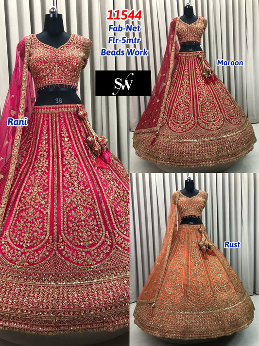 Rani Pink Maroon Rust Orange Net Lehenga