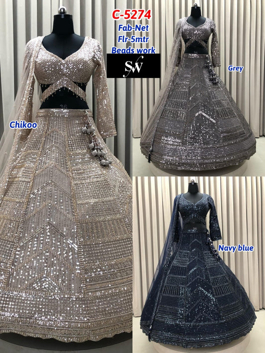 Silver Grey Chiku Golden Navy Blue Net  Lehenga