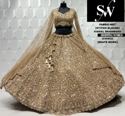 Peach net crop top lehenga