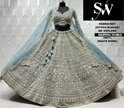 Peach net crop top lehenga