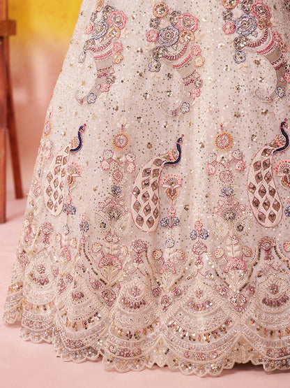 Tremendous Peacock Cream Net Fabric Sequins Lehenga 6246