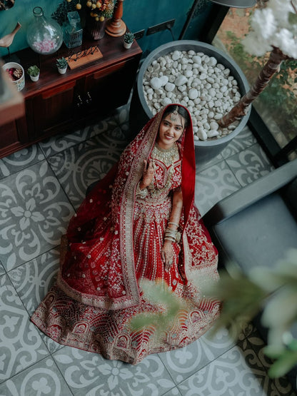 Khoobsurat jhumka red  Bridal lehenga Happy Customer