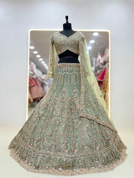 Pista green net crop top lehenga