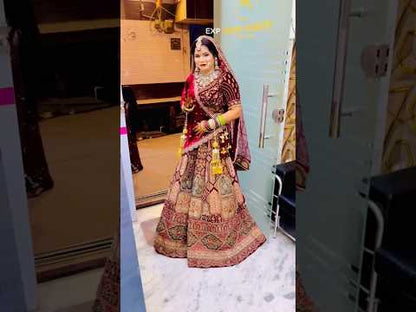 Glamorous maroon bridal Lehenga happy customer