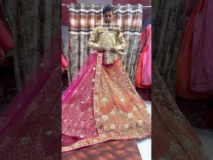Deliciosa lehenga nupcial en color naranja melocotón