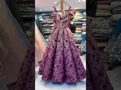 Embellished maroon peach ball gown