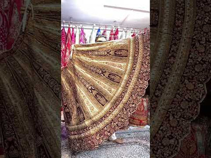 ليهينغا زفاف فاخرة من تصميم مصمم أزياء، مصنوعة من قماش ماروار ثقيل، بلون خمري داكن، وخردلي، وعاجي، وأبيض.