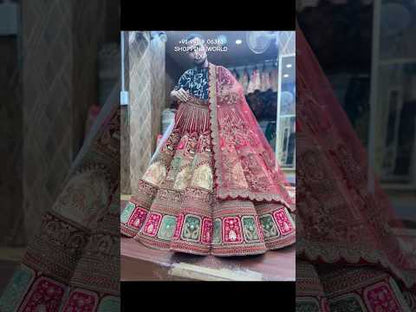 Increíble lehenga nupcial de baile color granate