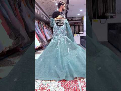 Designer green gown huge flair