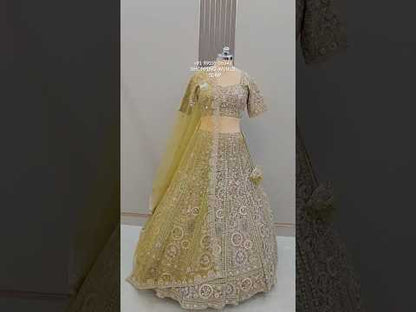 Embellished yellow crop top Lehenga