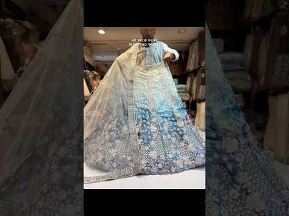 Increíble lehenga azul cielo de pavo real
