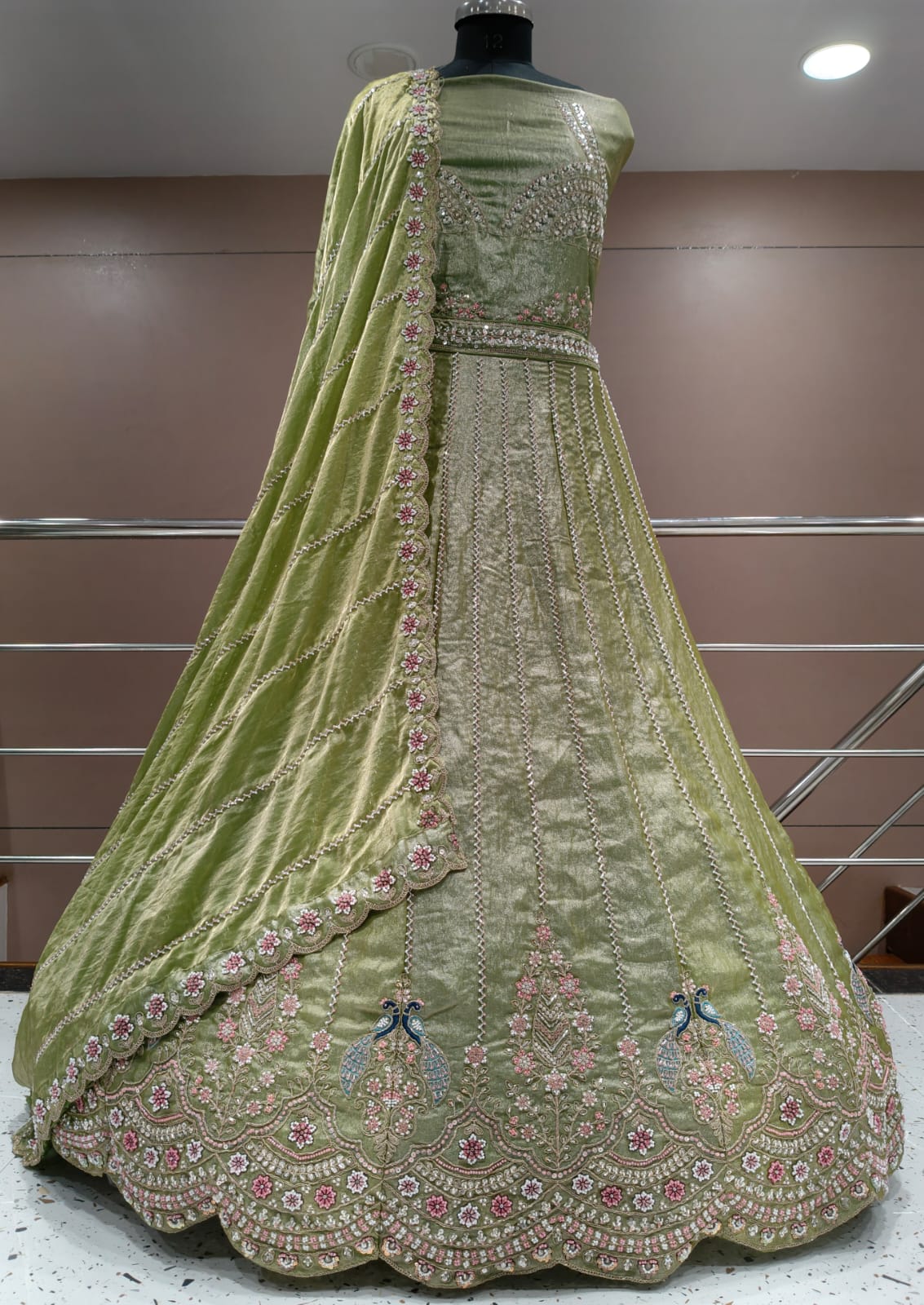 Pretty peacock semi stitched lehenga pink green blue mauve