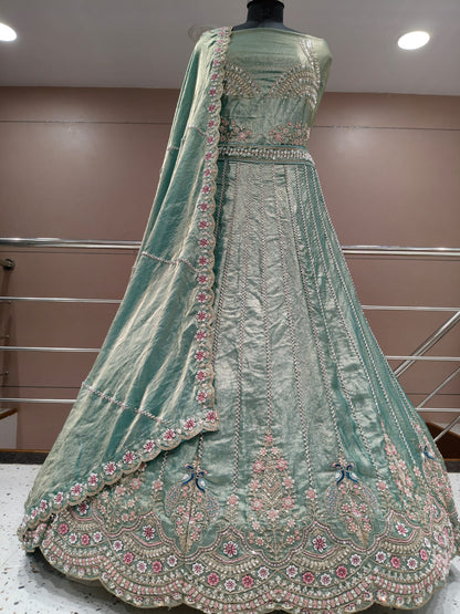 Pretty peacock semi stitched lehenga pink green blue mauve
