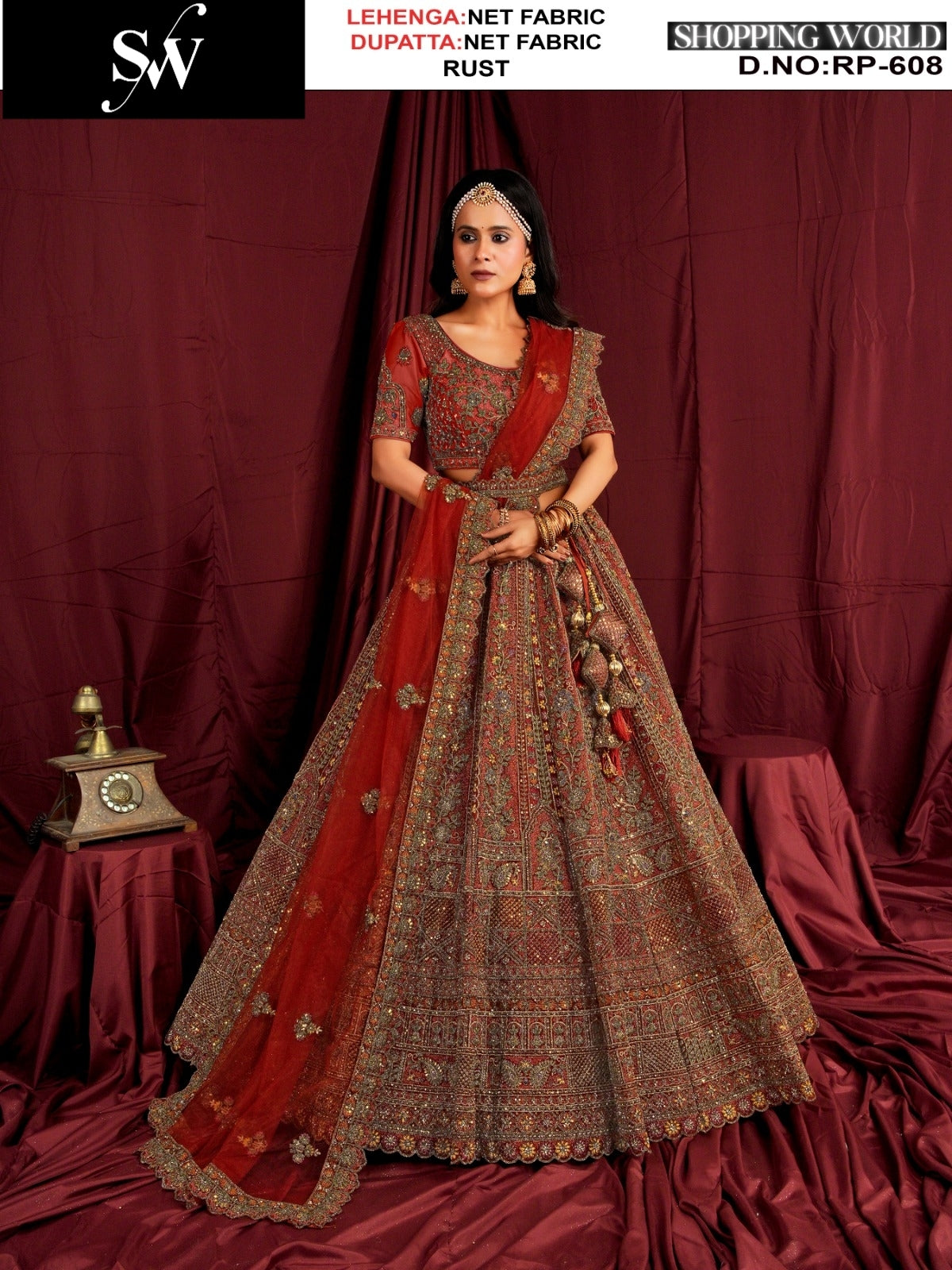 Good looking Rust Net Bridal Lehenga