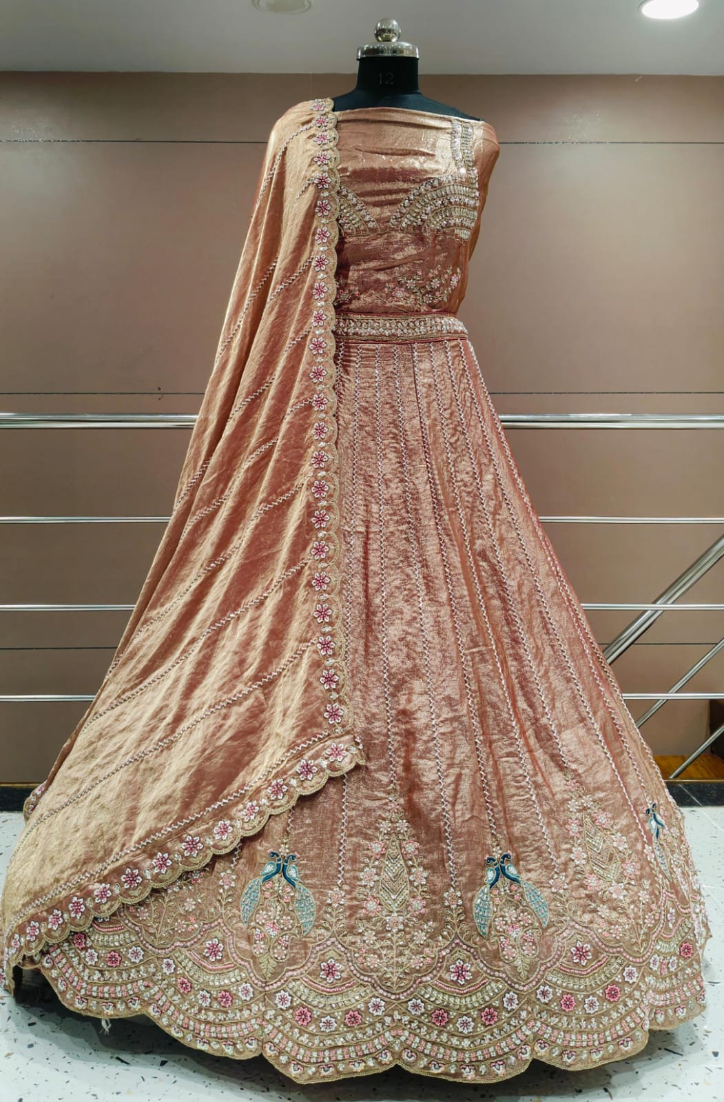 Pretty peacock semi stitched lehenga pink green blue mauve